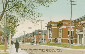 Colorized photograph of a street scene with public buildings on the right side.