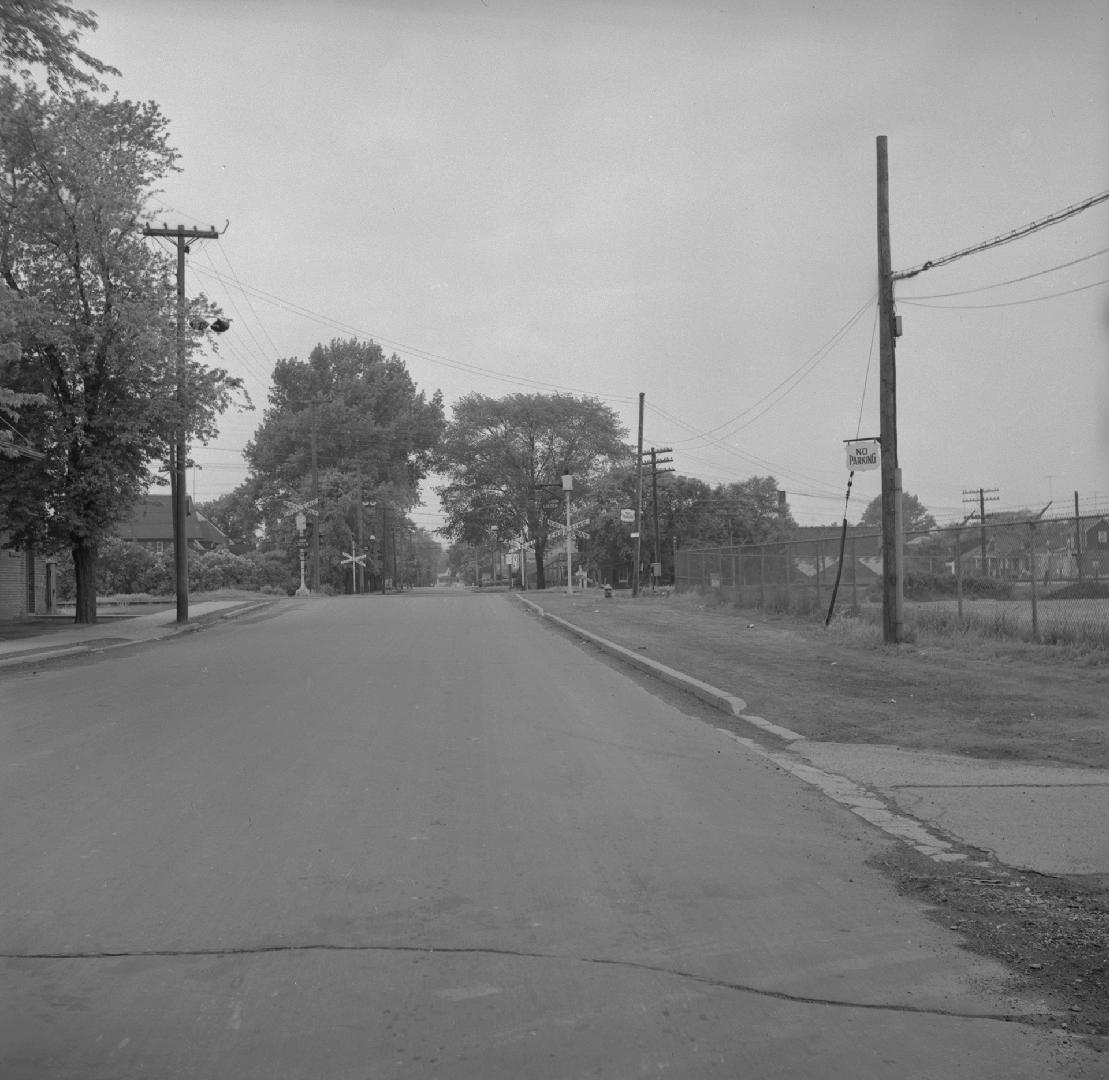 Denison Road E., looking west to railway crossing between Weston Road & Jane St., Toronto, Ontario