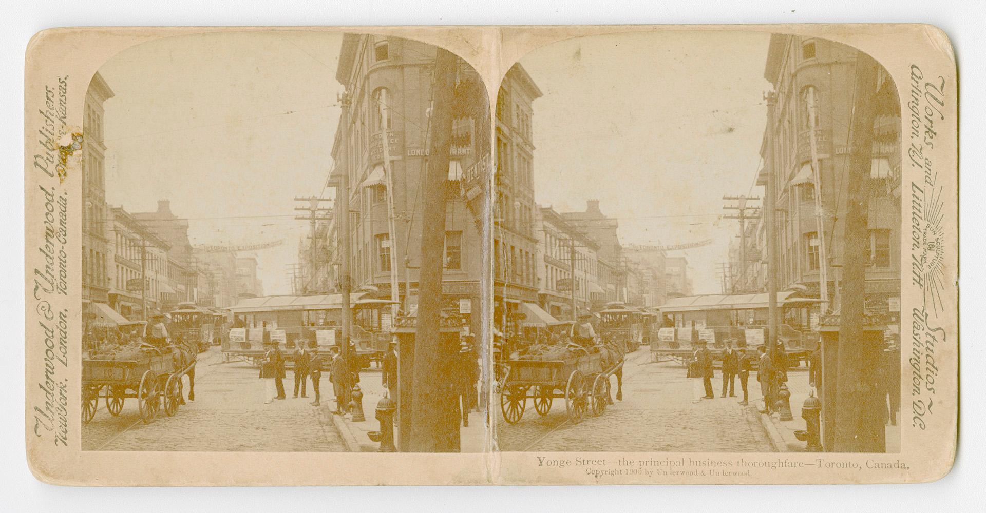 Pictures show a busy downtown street with pedestrians and horse drawn vehicles.