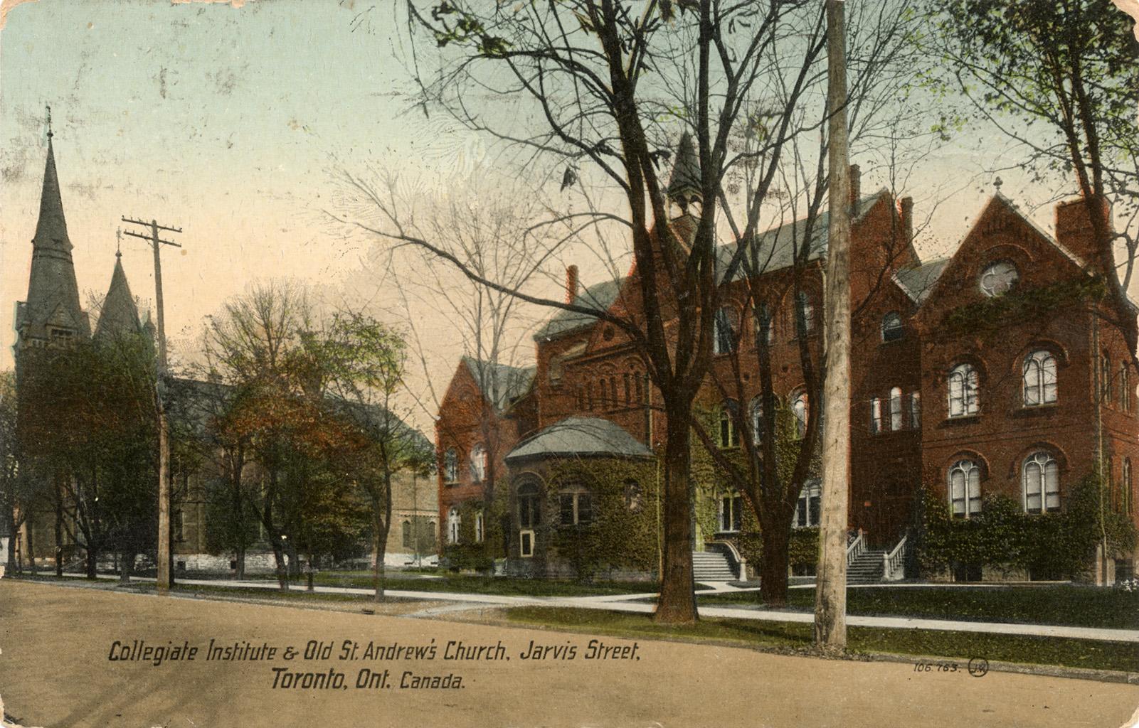 Colorized photograph of a gothic church and a Victorian school building on a tree lined street. ...
