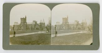 Pictures show a very large gothic academic building with a central tower.