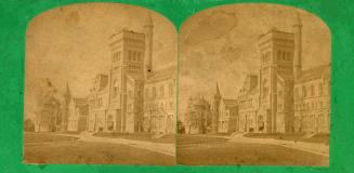 Pictures show a very large collegiate gothic building.