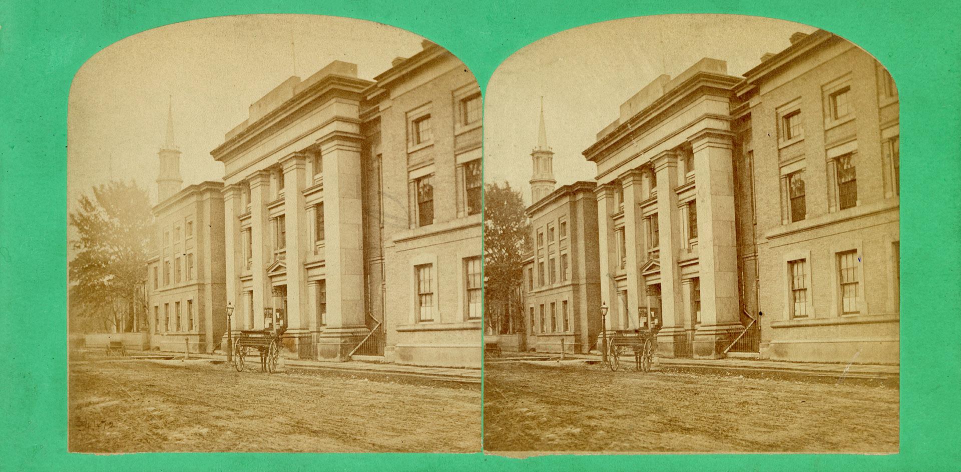 Pictures show a three story neo-classical building with a horse and cart in front of it.