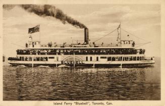 Sepia toned photograph of a crowded ferry boat on the open water.