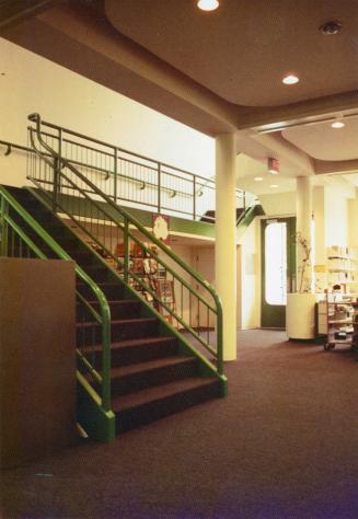 Entrance and staircase to a library.