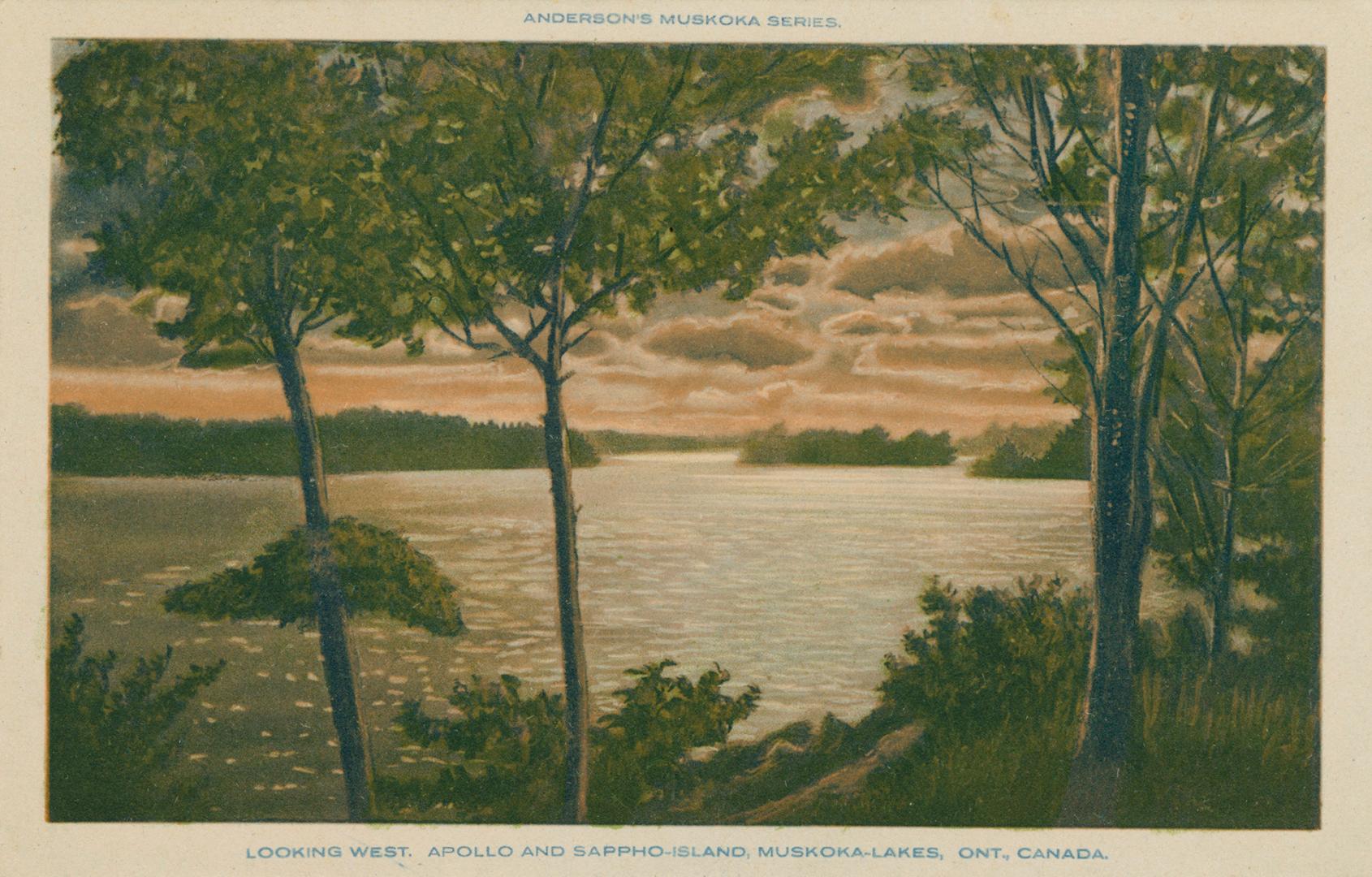 A lake with many islands; trees in the foreground.