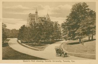 Car on a roadway in front of trees and a large collegiate building. Sepia toned.