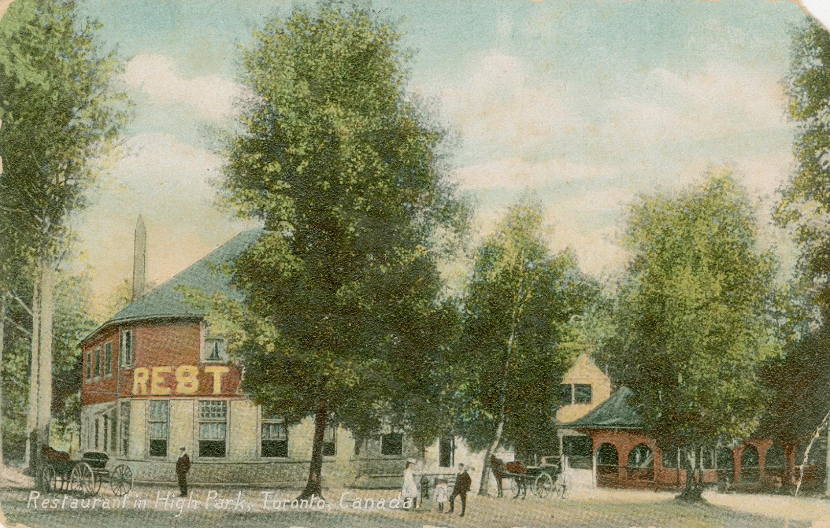 People and horse drawn carriages in front of a two story commercial building in a wooded area.
