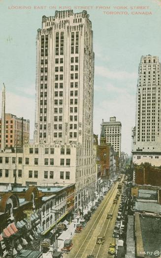  Art Deco sky scrapers line a city street. 