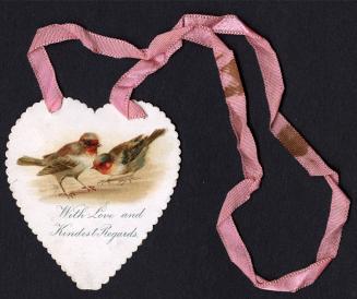 This flat card is shaped like a heart. It has a pink ribbon at the top. Two small birds are pic ...
