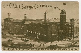 Picture of a large brewery with front tower and streets with horses and carriages. 