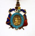 A metal charm hanging from a red, white, and blue ribbon. Queen Victoria silhouette in an oval  ...