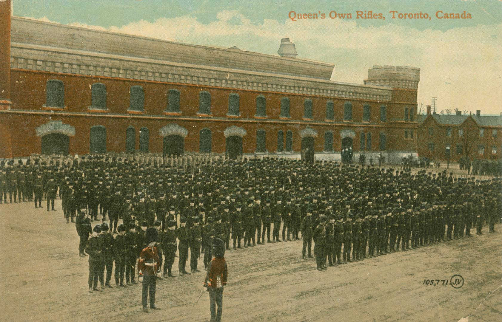Colorized photograph of a large group of soldiers mustered in front of a large castle-like buil ...