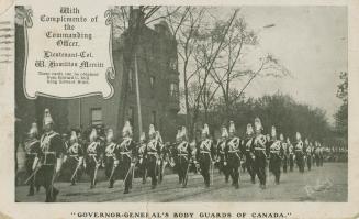 Black and white photograph of soldiers in dress uniform on parade.