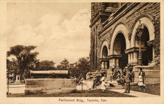 Picture of three entrance to the parliament buildings with people sitting and standing on the f ...