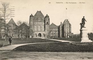 Picture of the Parliament buildings and front lawn with monument on right. 