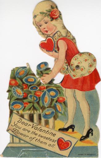 A mechanical card. A woman in a red dress holds a heart in one hand and a flower in the other.  ...