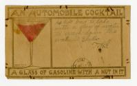 Picture of a martini glass filled with red liquid and a metal nut at the bottom.