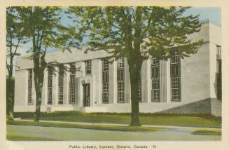 Picture of large white stone library building. 