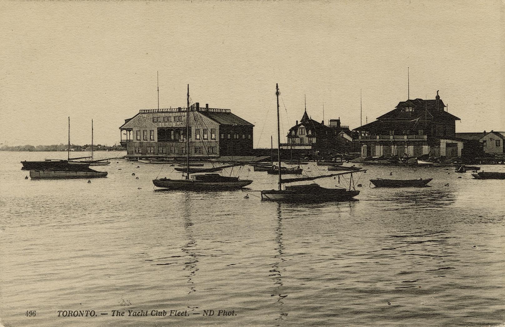 Sepia-toned photo postcard depicting boats floating on Lake Ontario with buildings in the backg ...