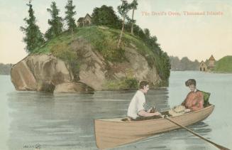 Colorized photograph of a man and a woman in a row boat in a body of water in front of an islan ...