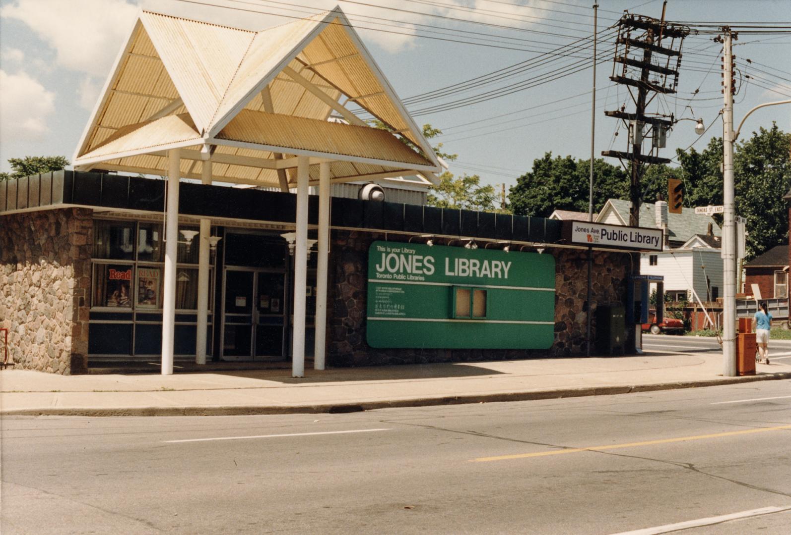 Picture of library branch with large portico. 
