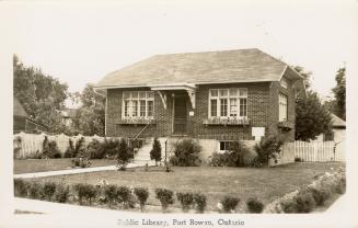 Picture of small cottage style library building. 