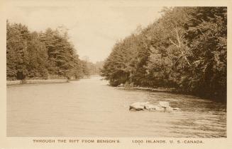  Sepia toned photograph of trees covering islands in the middle of a waterway. 
