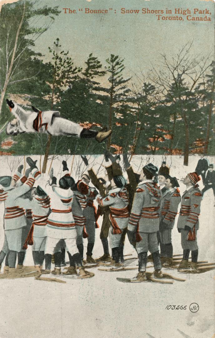 Colorized photograph of a group of men on snow shoes tossing a man into the air.