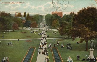 Colorized photograph of people walking down a long path in a park.