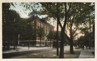 Colour postcard depicting the exterior view of a building, viewed from the south west corner of ...