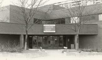 Picture of brick community centre with library. 