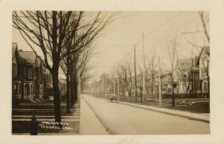 Black and white photo postcard with a white border depicting a view looking west from Yonge Str ...