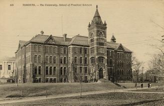 Black and white photo postcard (now sepia-toned) depicting the rear entrance of a large buildin ...