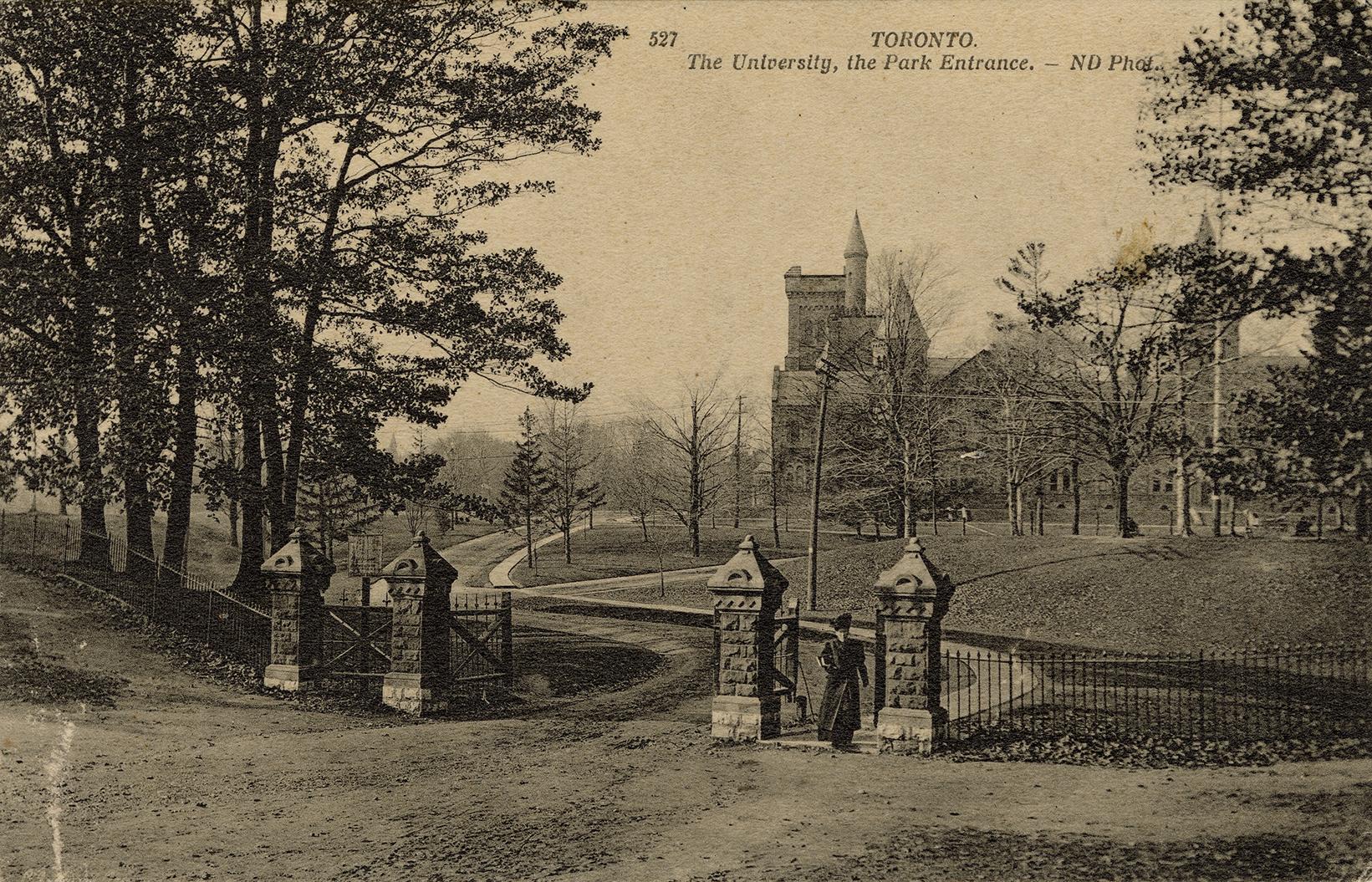 Black and white photo postcard (now sepia-toned) depicting the entrance gates to the park at Un ...