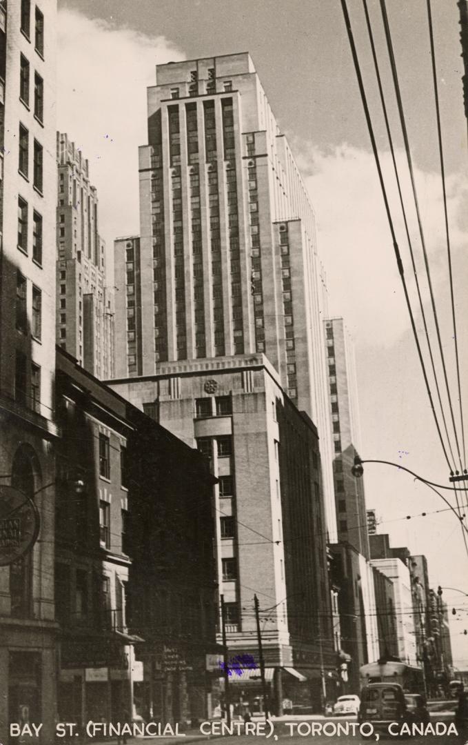 Black and white photograph of skyscrapers in a large city.