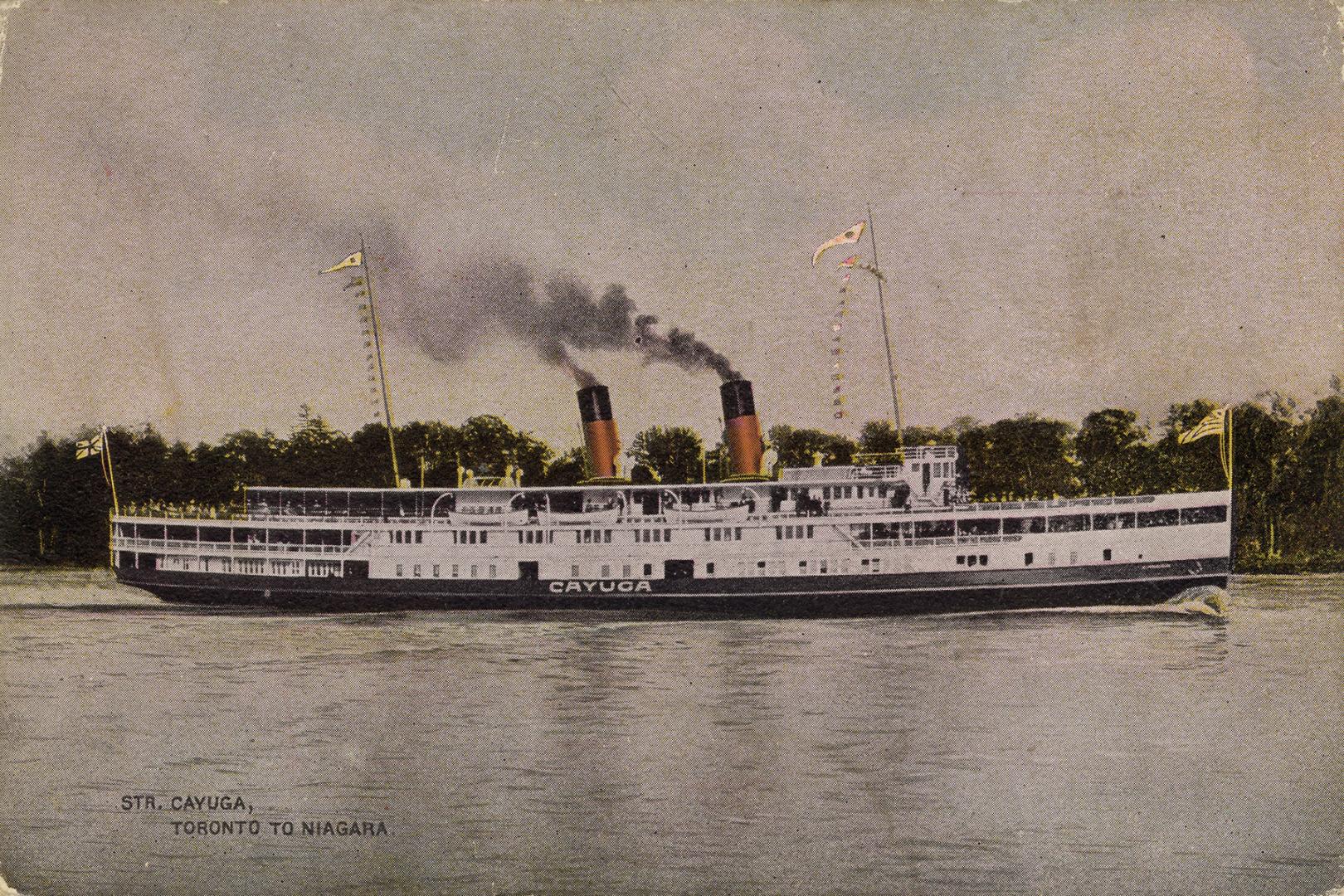 Colorized photograph of a steamship near a shoreline