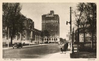 Black and white photo postcard depicting a view looking north up Avenue Road with the Royal Ont ...