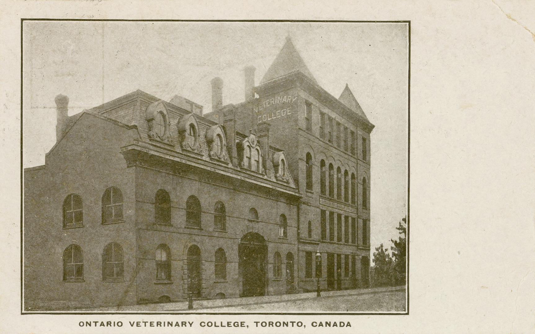 Black and while photograph of a three story collegiate building.