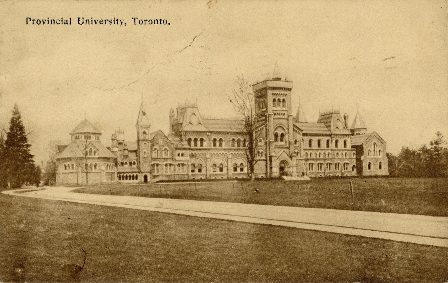 Black and white photograph of a huge, Romanesque Revival style building.