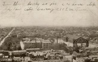 Black and white aerial photograph of a large city.