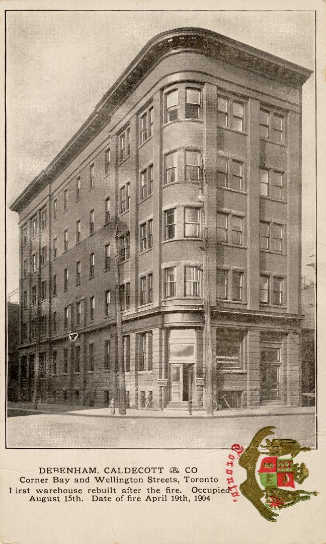 Black and white photograph of a five story industrial building.