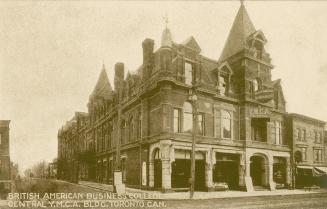 Black and white photograph of a large building in the Richardsonian Romanesque style of archite ...