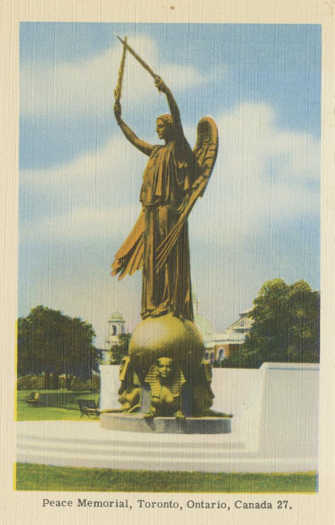 Colorized photograph of a statue of a woman with wings holding two crossed swords.