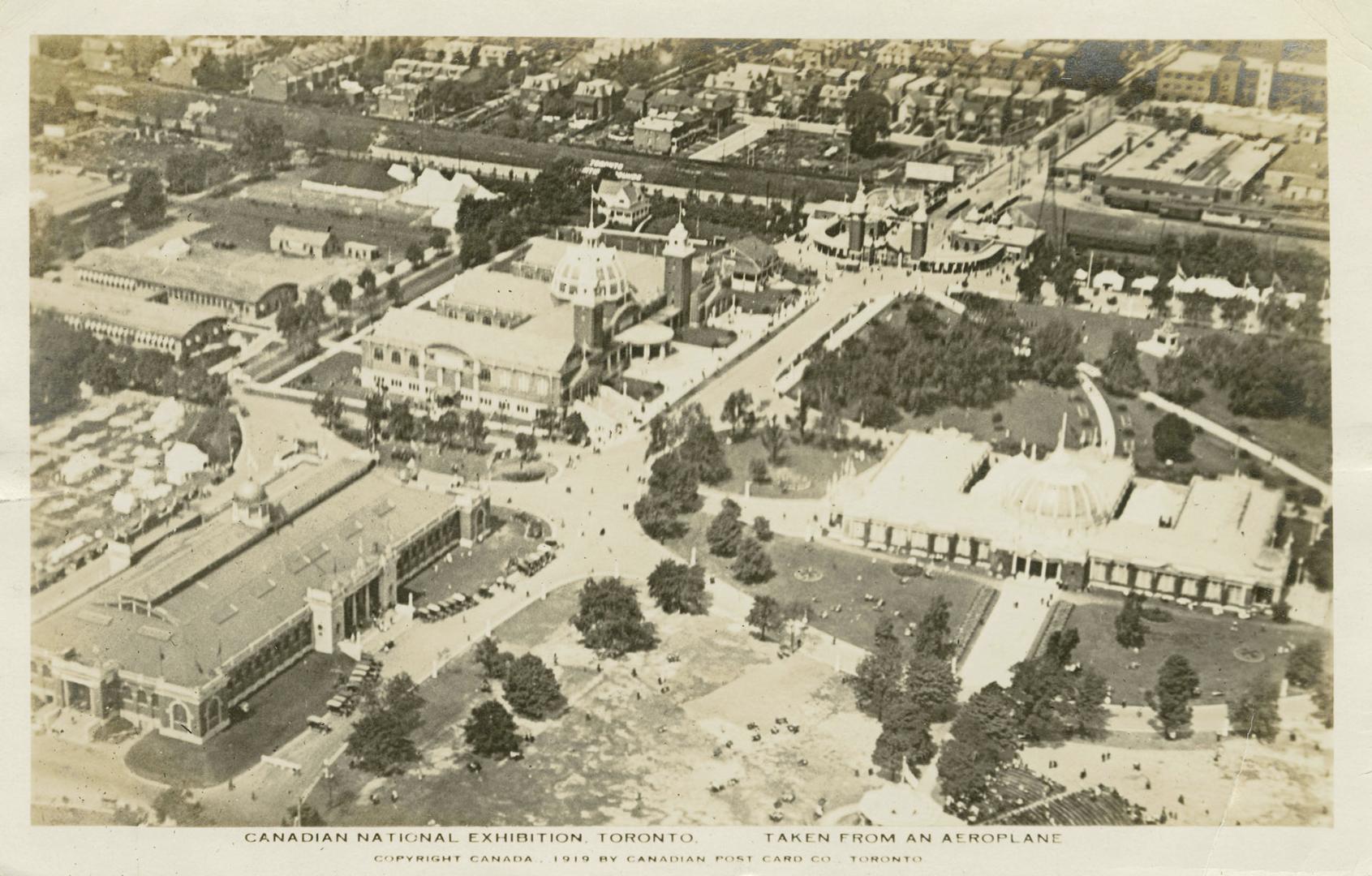 Black and white, aerial shot of large, public buildings.