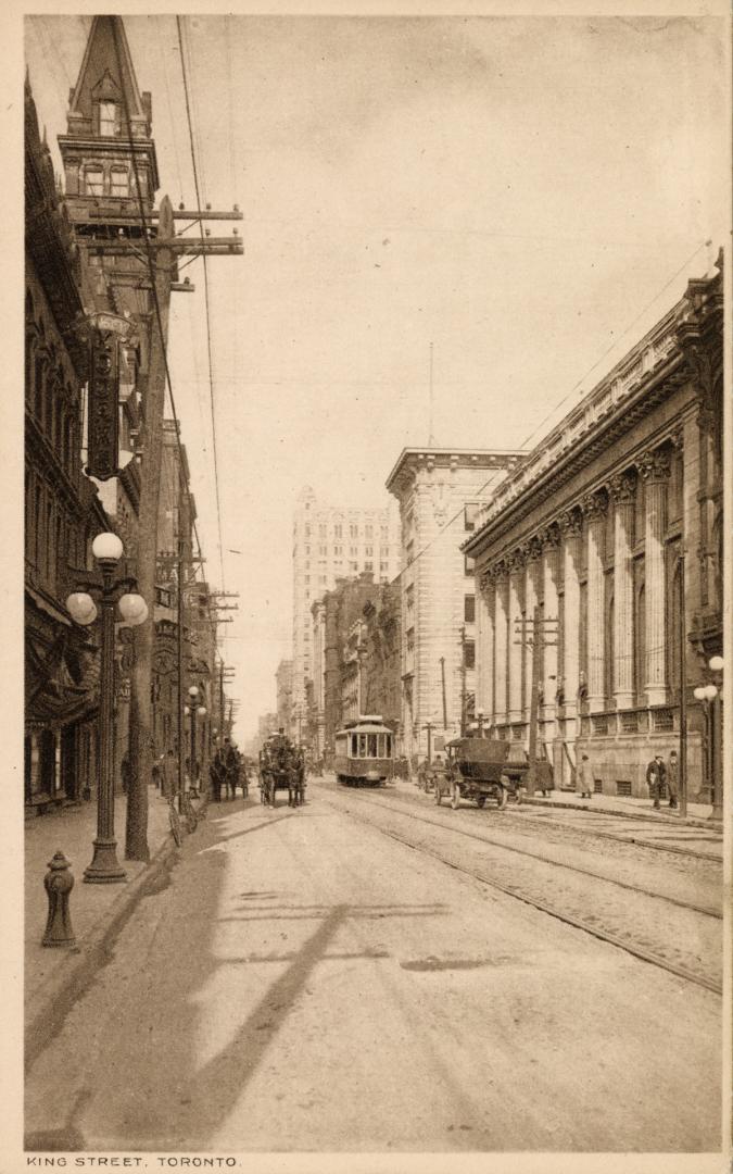 Sepia-toned photo postcard of King Street looking east towards Bay Street, the Mail and Empire  ...