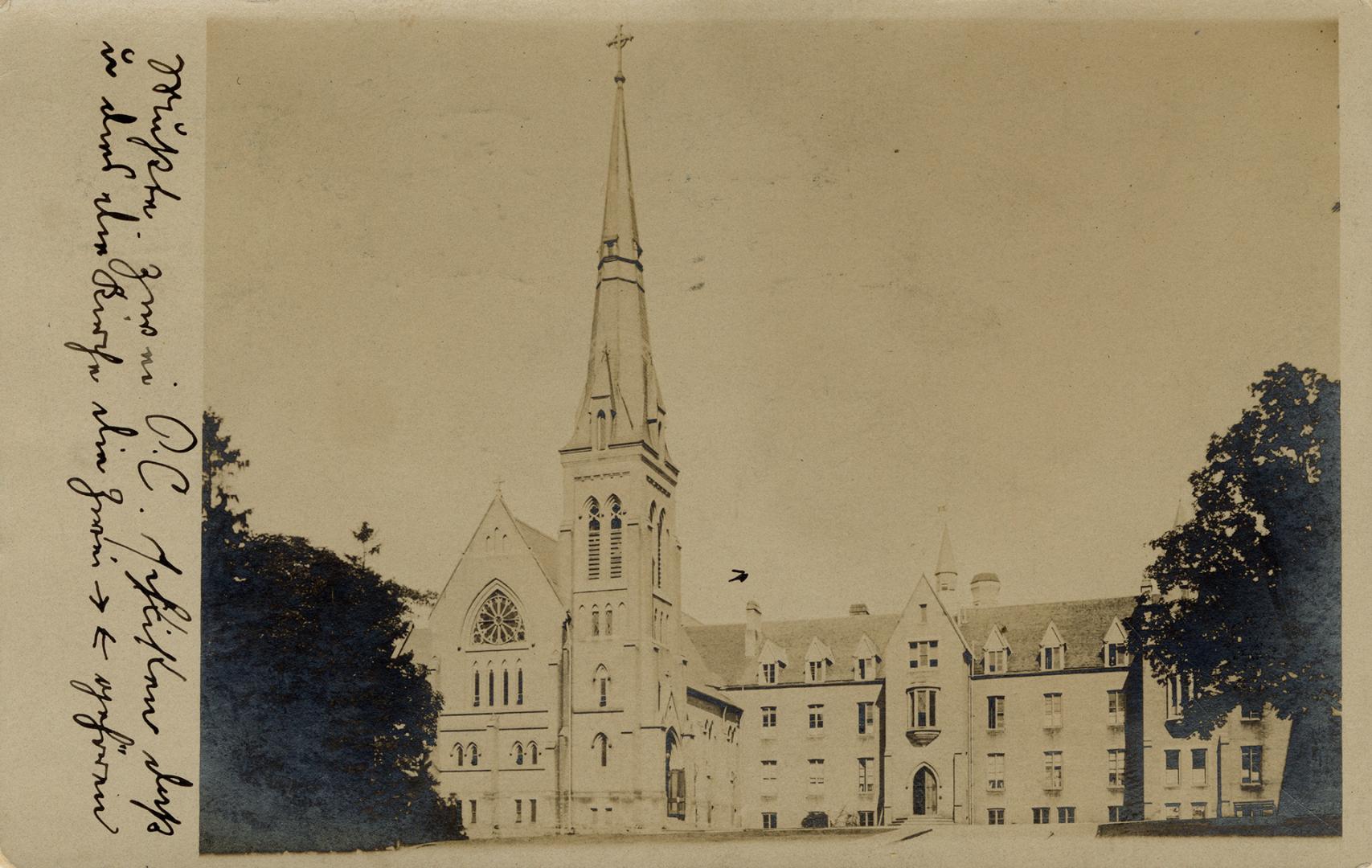 Sepia-toned photo postcard depicting the exterior of St. Basil's Church in Toronto. There is ha ...