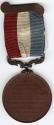 Copper medal with red, white, and blue ribbon and clasp.Decorative hanger at 12 o’clock.(obvers ...