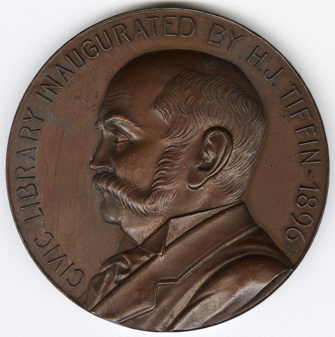 Bronze medal.(obverse) Bust of H.J. Tiffin left facing. Inscription: "CIVIC LIBRARY INAUGURATED ...