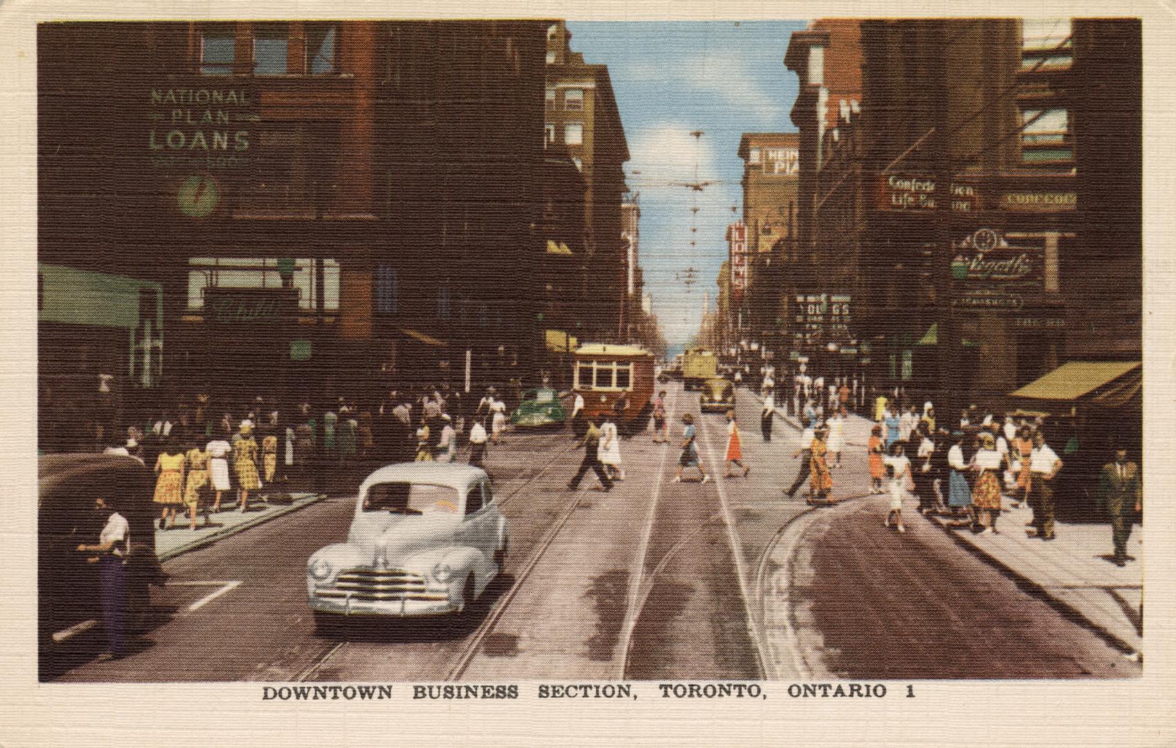 Colour postcard depicting a downtown street with a streetcar, cars, and pedestrians on the side ...